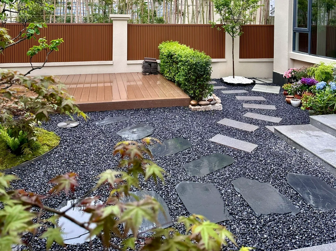 What are the benefits of covering flowerbed surfaces with gravel? A top choice for low-maintenance landscaping.