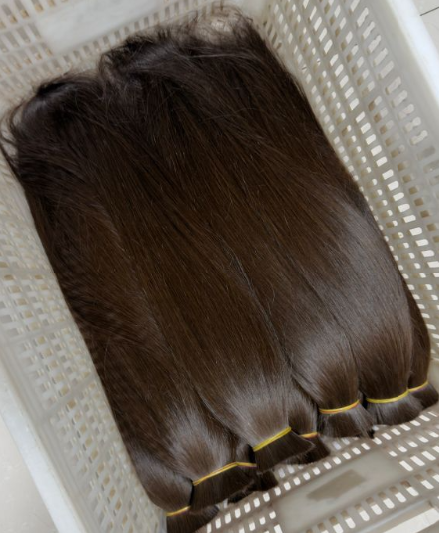 Labeled hair extension sample with an approved product specification.png