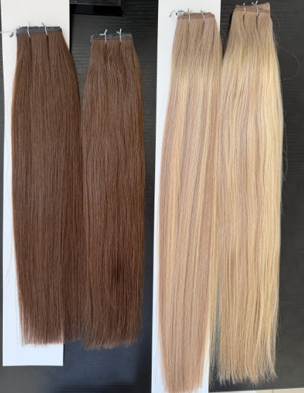 Human hair bundles sorted before extension production.jpg