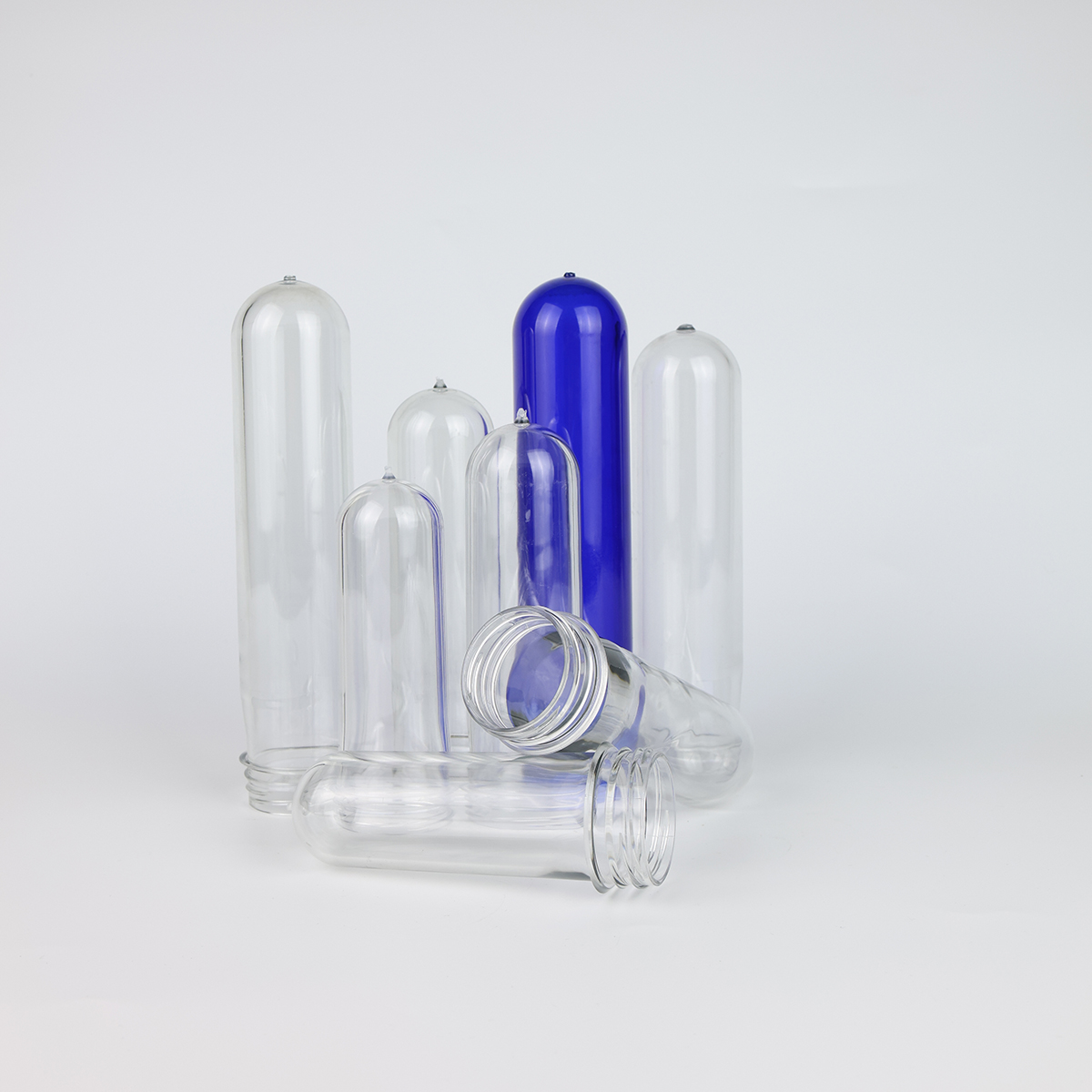 What is a PET preform and how is it made in factories?