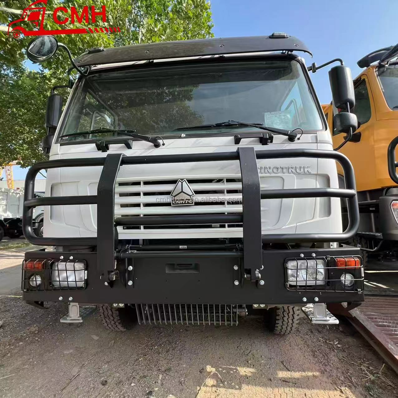 SINOTRUK HOWO 8X4 Heavy Duty Dump Truck with 400 Horsepower and 13R22.5 Tires the Bumper Is Ghost Mask High Quality for Sale.