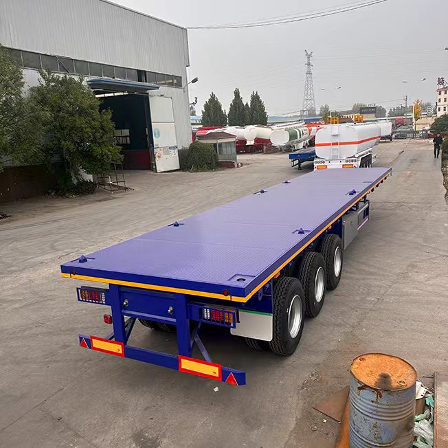 2026 Year High Quality 3 Axles Payload 36 Ton Flat Bed Semi Trailer Suitable for Transporting 40-foot or 20-foot Containers