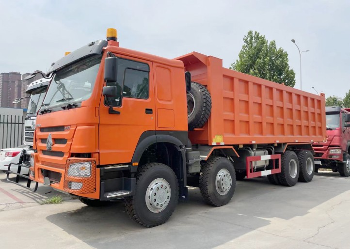 SINOTRUK HOWO High Quality 8X4 Tipper Truck with 371 Horsepower and 12.00R20 Tire Suitable Mine Transportation for Sale.