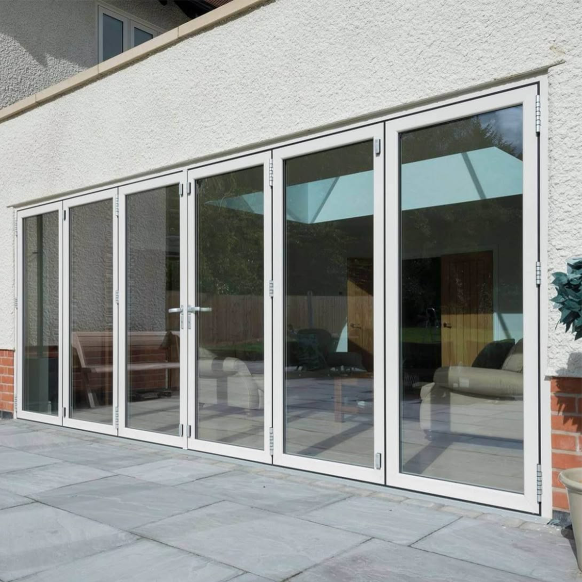 How Aluminium White Bifold Doors Enhance Natural Light in Your Home