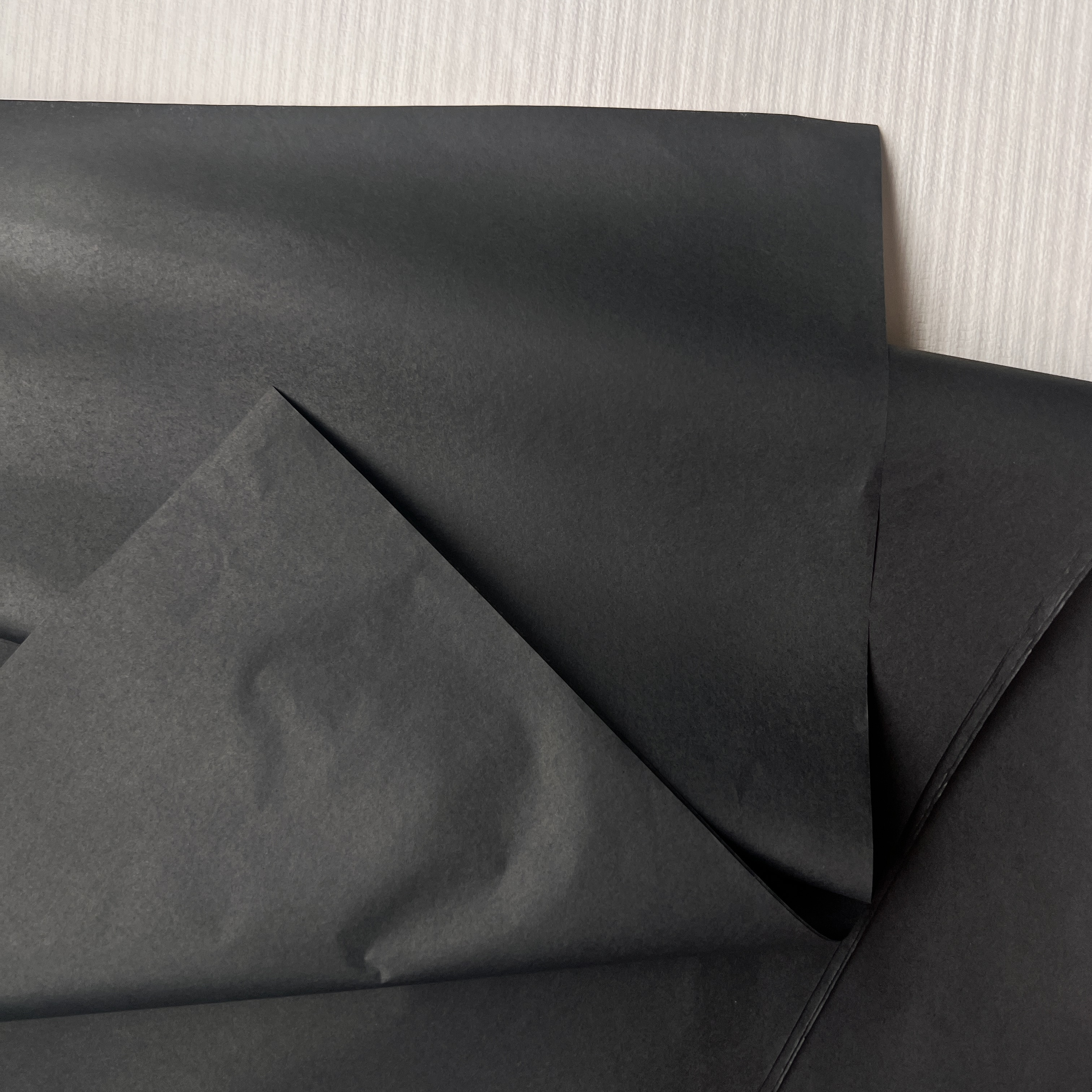 High-Quality Black Paper Rolls for Industrial Use.