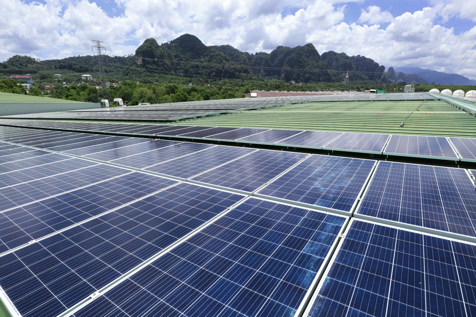 Can premium solar panels reduce operational costs for industrial parks?