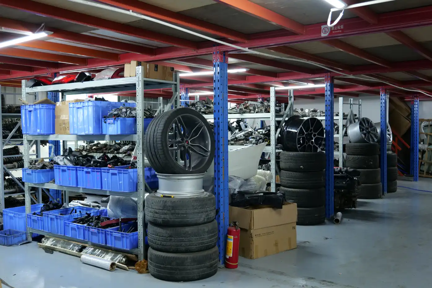 luxury car OEM used parts warehouse.webp