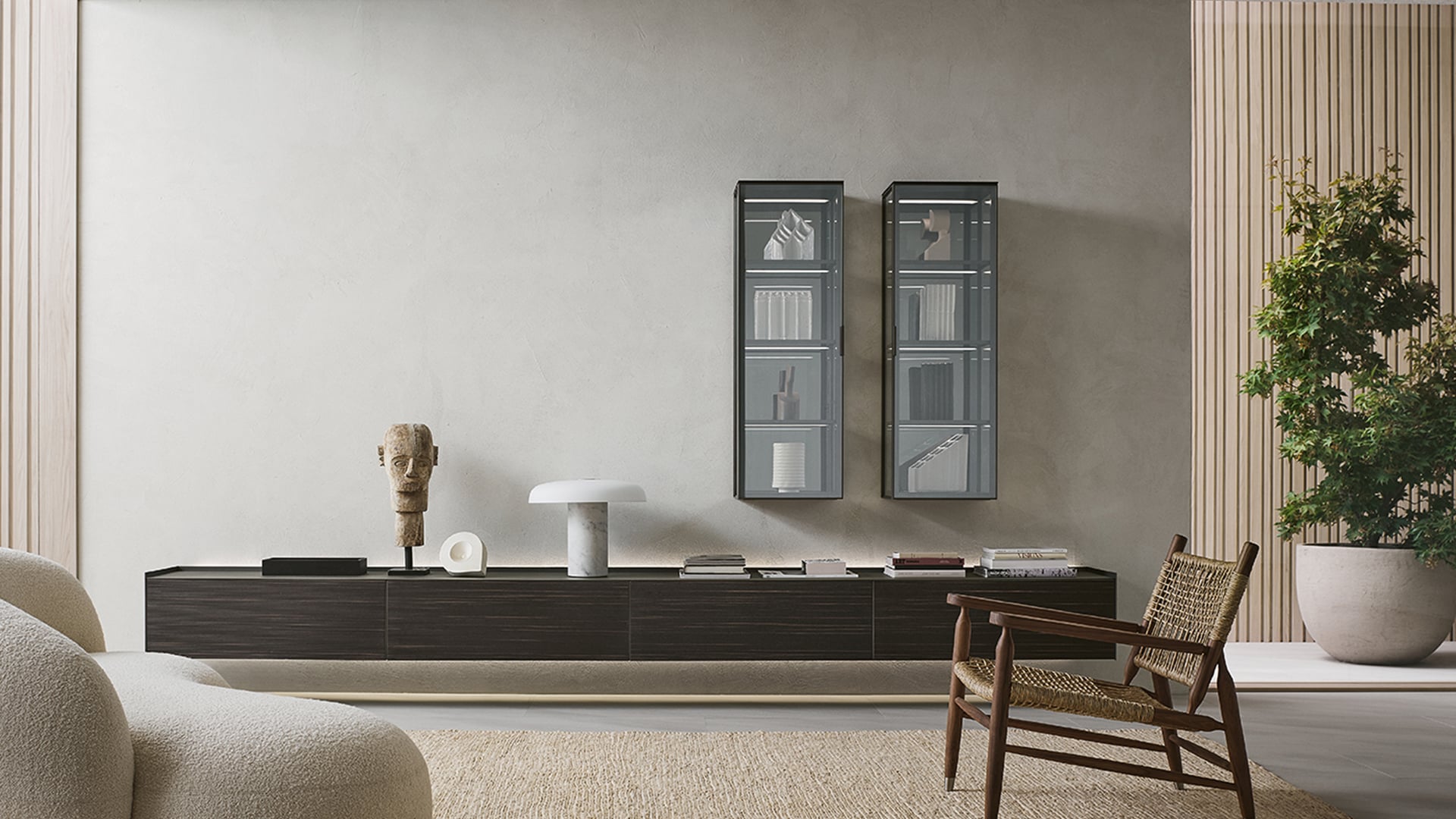 Pair of compact wall mounted glass display cabinets above a low sideboard