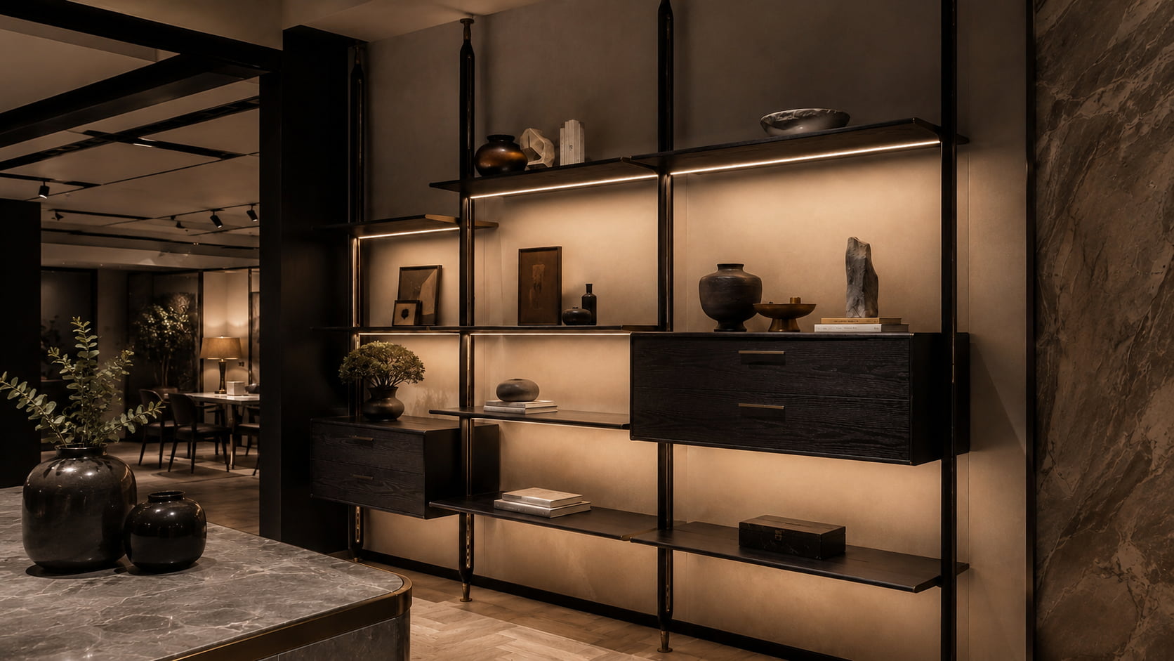 Dark floor-to-ceiling modular bookshelf with open shelves suspended drawers and media storage