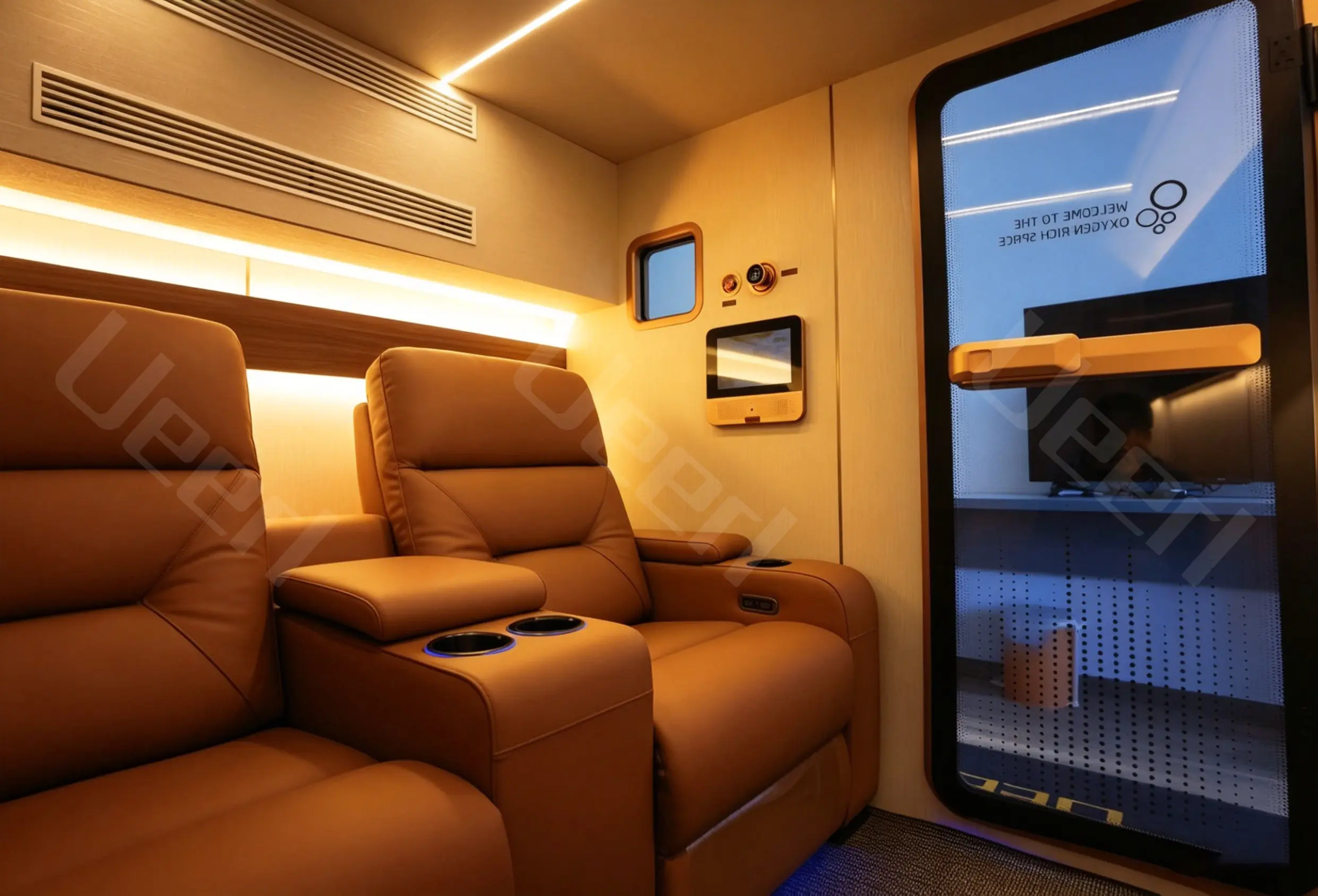 Luxury interior of a Ueerl room-style hyperbaric oxygen chamber with two reclining seats