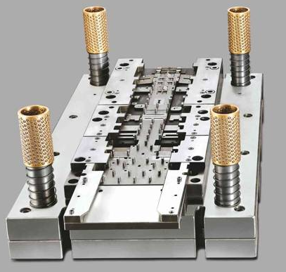 a progressive die stamping press system integrating coil feed multi station die and precision controls for high volume metal part production