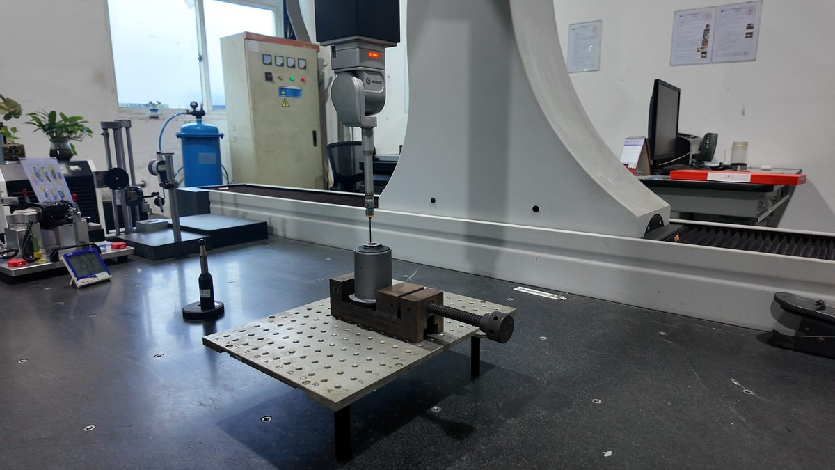 CMM dimensional inspection of a stamped automotive part against a ballooned drawing