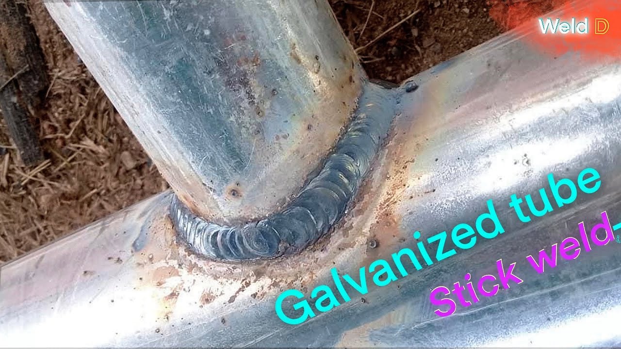 welder preparing galvanized steel with ventilation before welding
