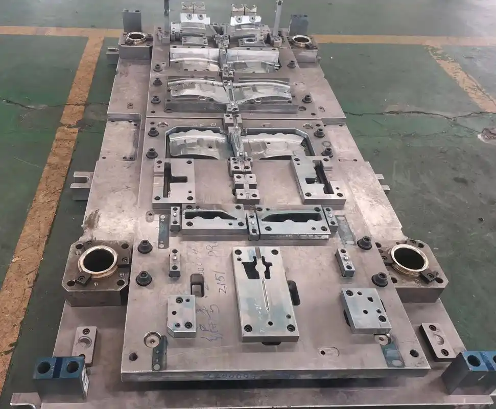 precision metal stamping die performing high speed forming operations in industrial press