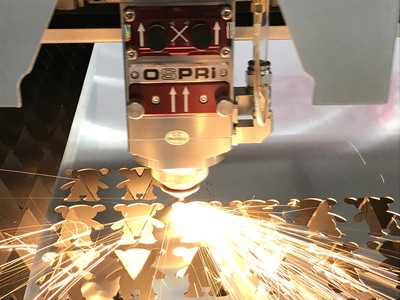 cad software interface showing optimized nesting layout for laser cutting