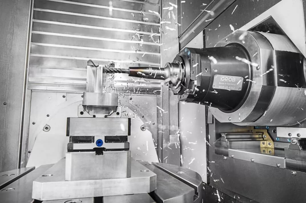 cnc milling machine precision cutting an aluminum aerospace component in a modern manufacturing facility