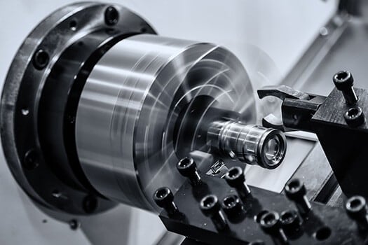 safe metal drilling setup with a clamped workpiece and aligned drill bit