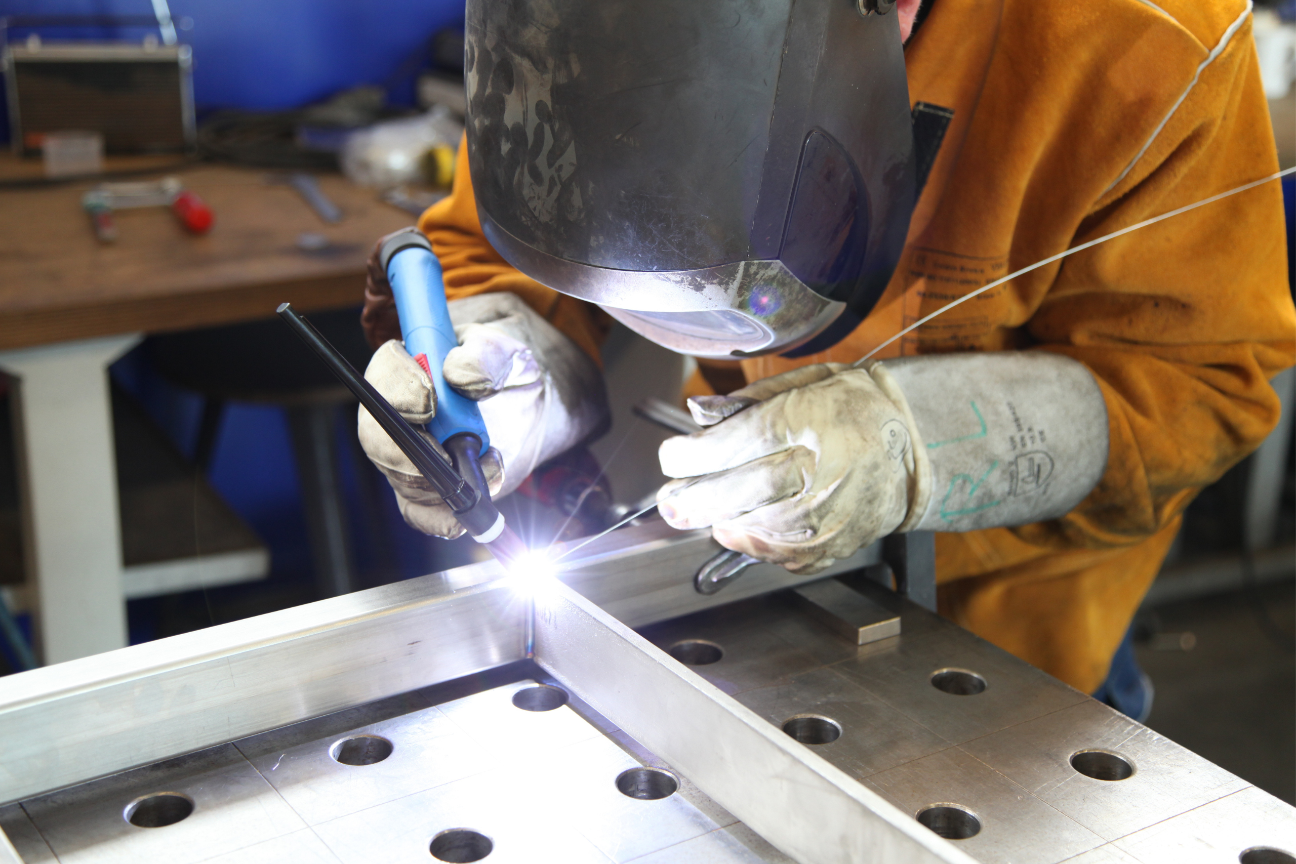 precision metal forming transforms flat sheet metal into complex components through controlled deformation