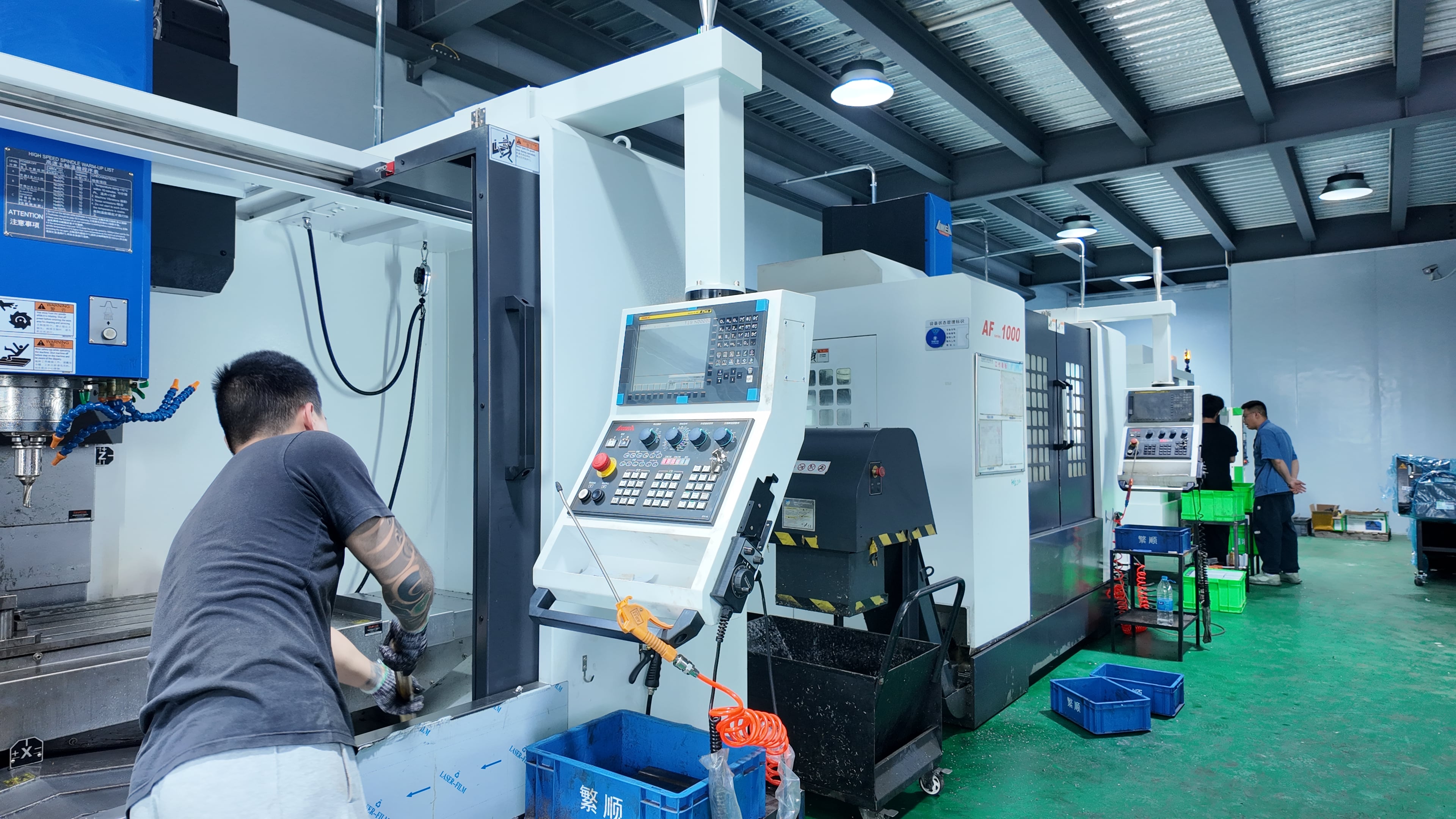 operator retrieving an RFID-tracked cutting tool from a smart cabinet