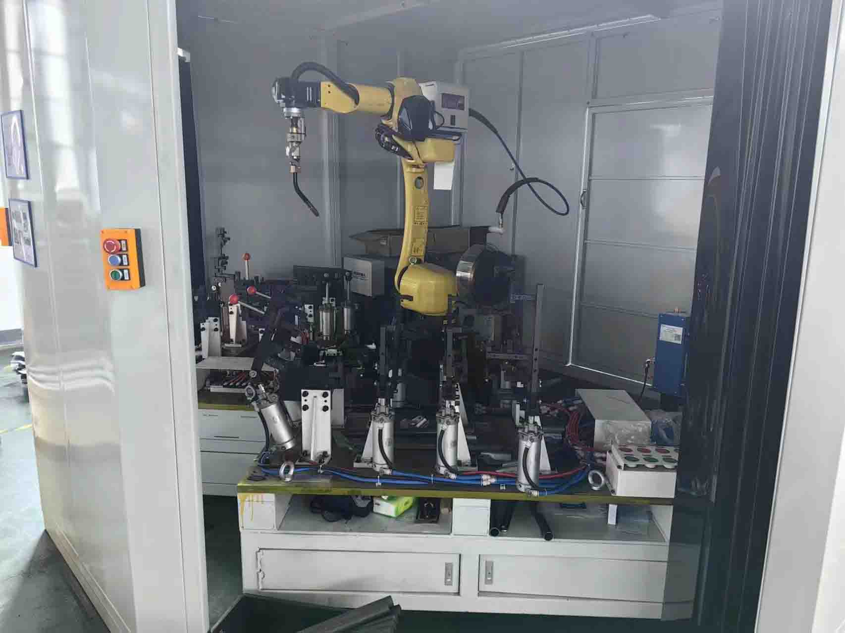 robotic welding fixture for automotive chassis subframe assembly