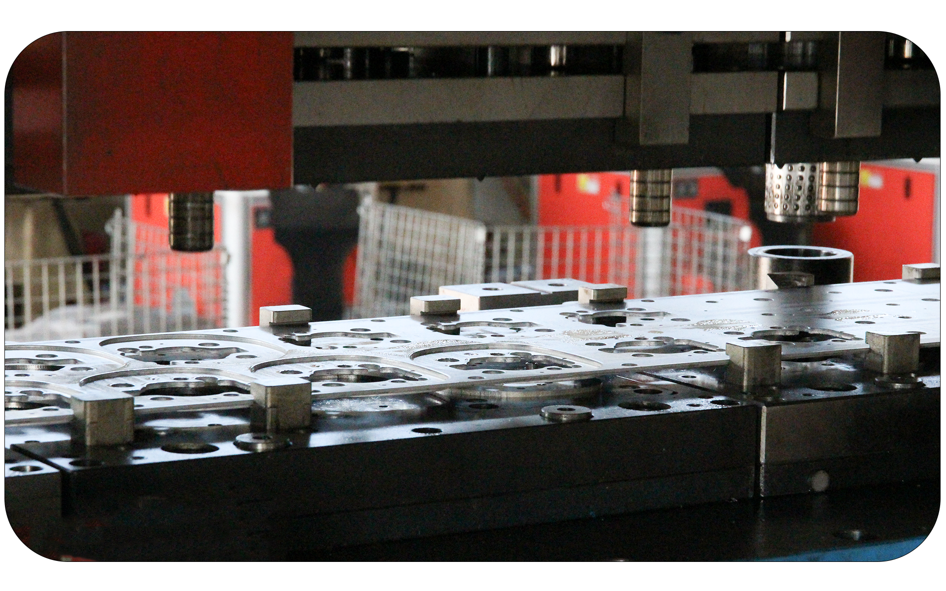 precision stamping press die assembly showing the punch and die block components essential for metal forming operations
