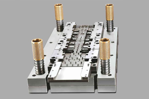 progressive die stamping transforms sheet metal through sequential stations in a single precision tool