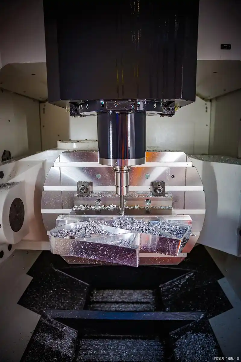 cnc milling machine precision cutting a metal prototype in a modern manufacturing facility