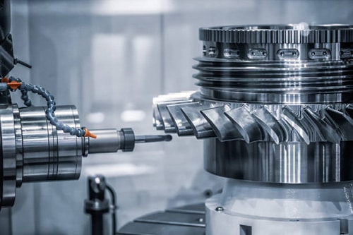 modern cnc machining center producing precision metal components