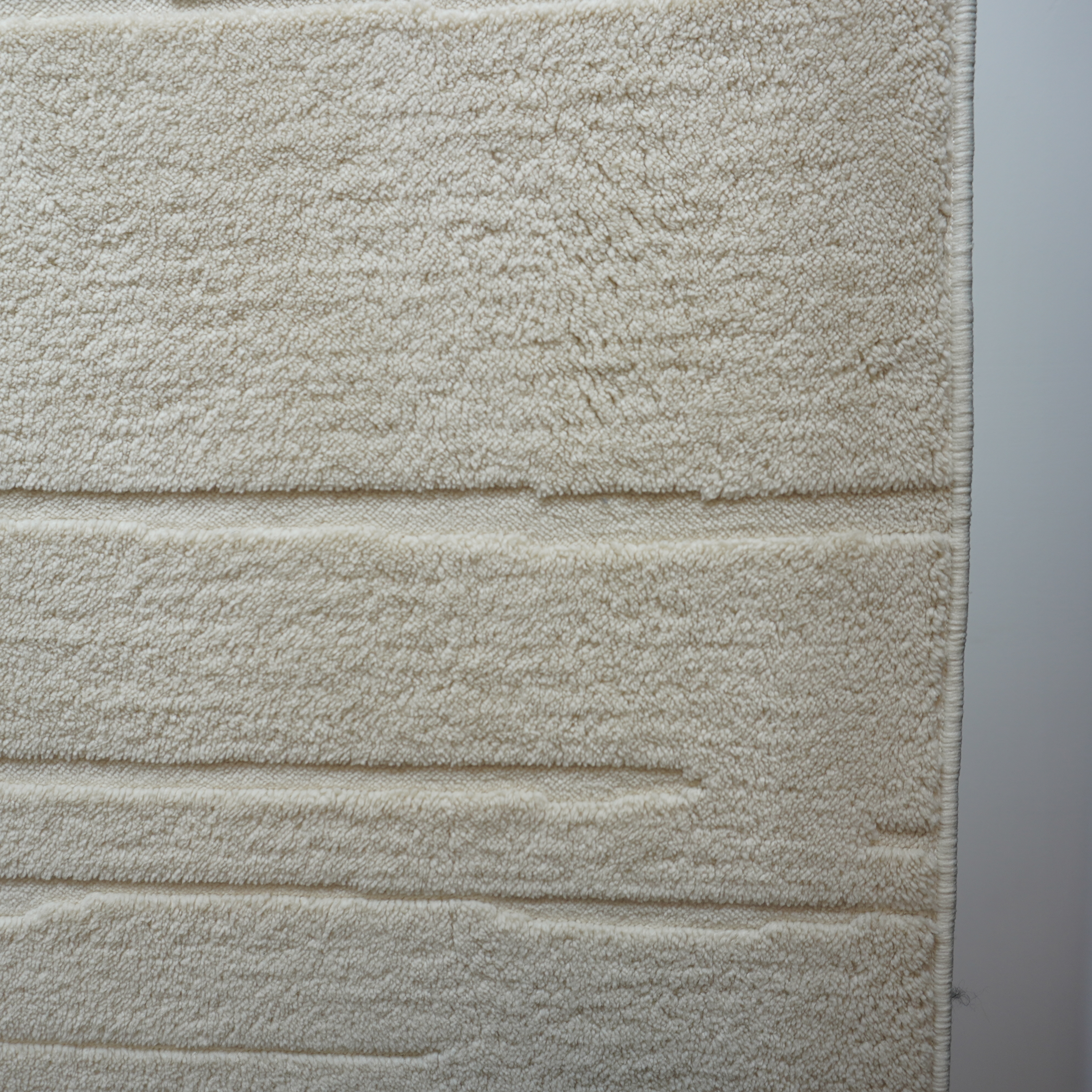 How to Maintain and Clean Your Cream Area Rug for Longevity