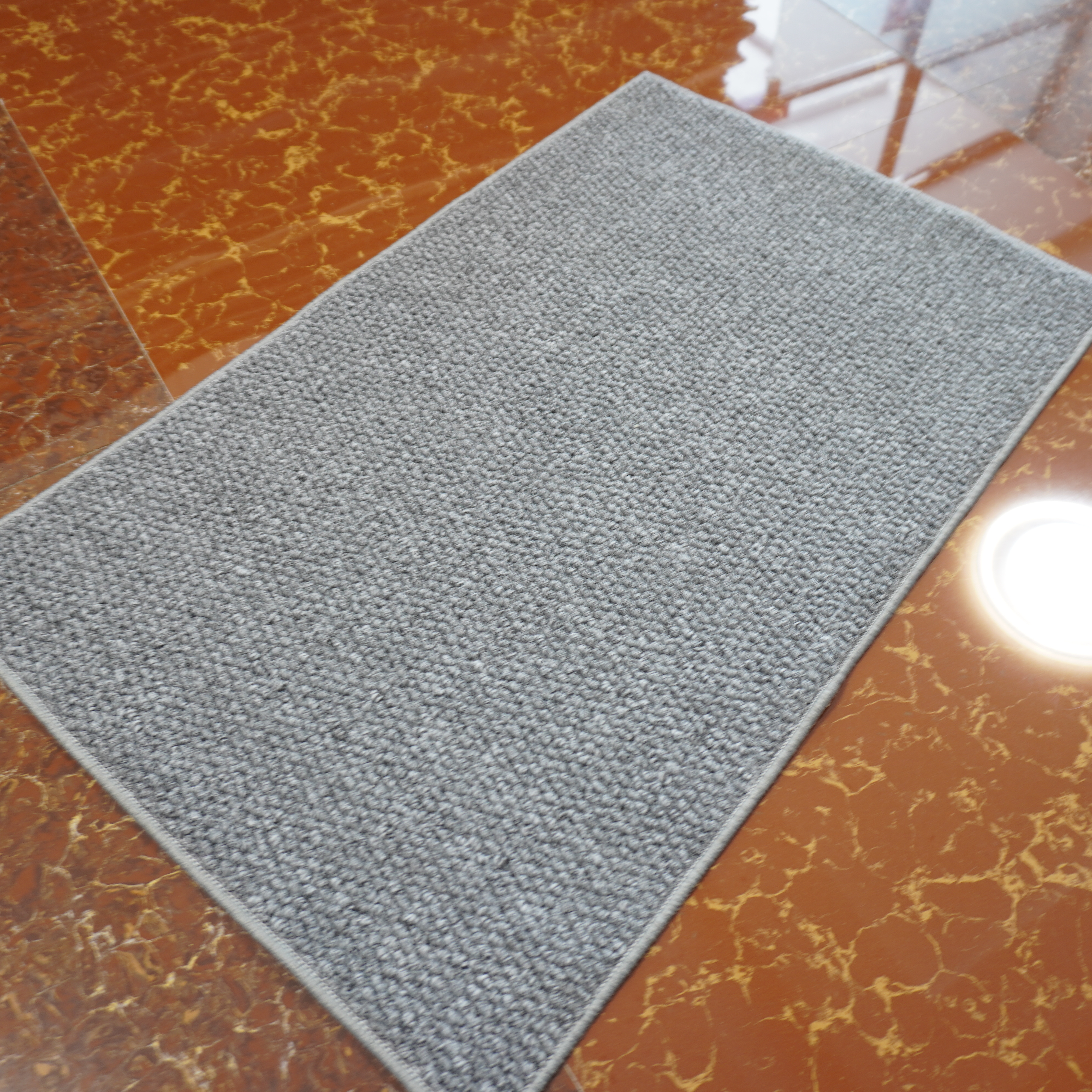 What Are the Benefits of Using Door Rugs in High-Traffic Areas?