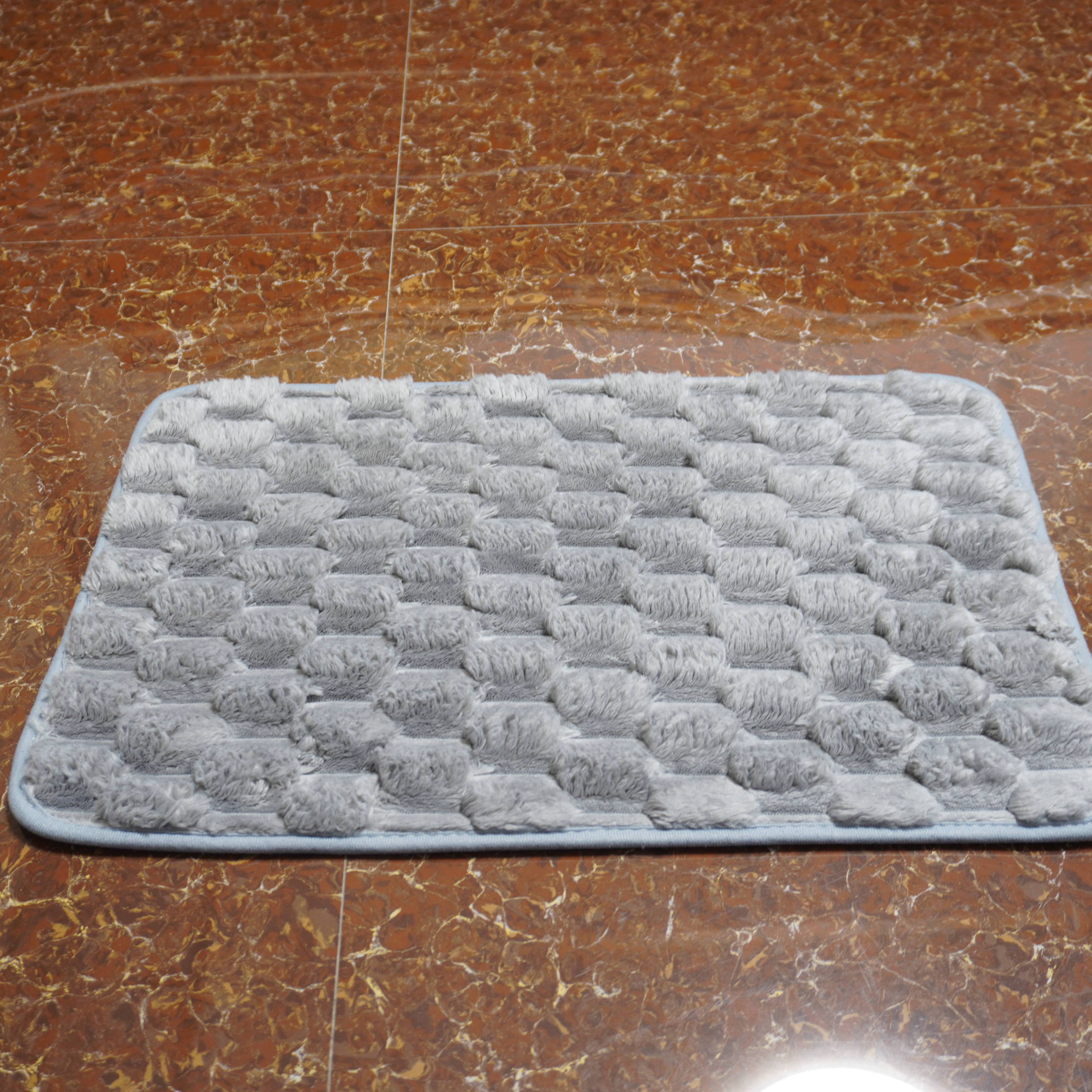 What Are the Benefits of Using Machine Washable Bathroom Carpets?