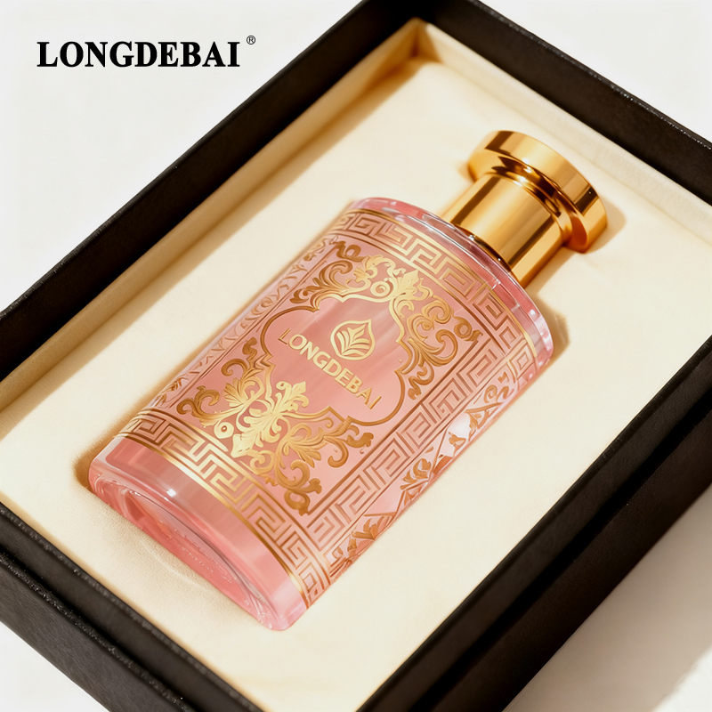pink-perfume-bottle-gold-cap.webp