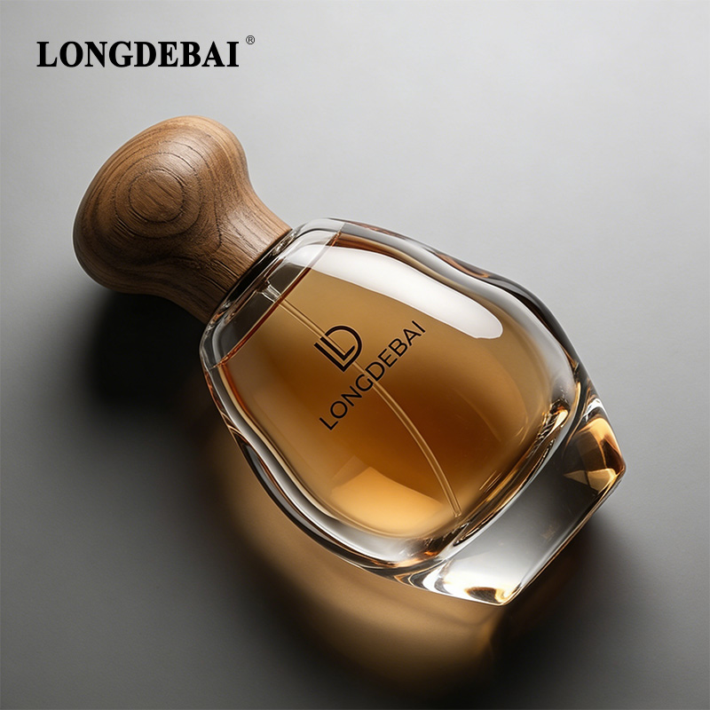 custom-clear-glass-perfume-bottle-wooden-cap.webp