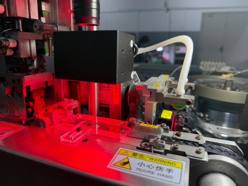 Project-specific CCD system for 100 percent external-dimension inspection of automotive locking pins