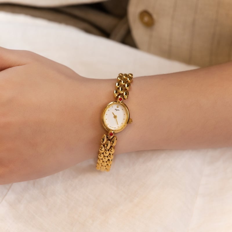ساعت مچی طلایی با تزئین سنگ‌های رنگارنگ کریستالی، ساعت کوارتز زنانه سفارشی، طراحی و تولید حرفه‌ای برای ساعت‌های زنانه