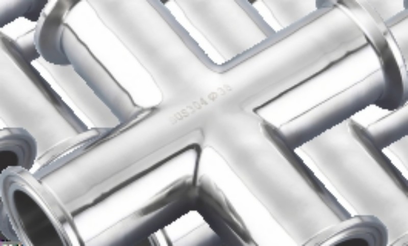 Stainless steel elbow fitting prepared with isolation kit at a carbon steel connection