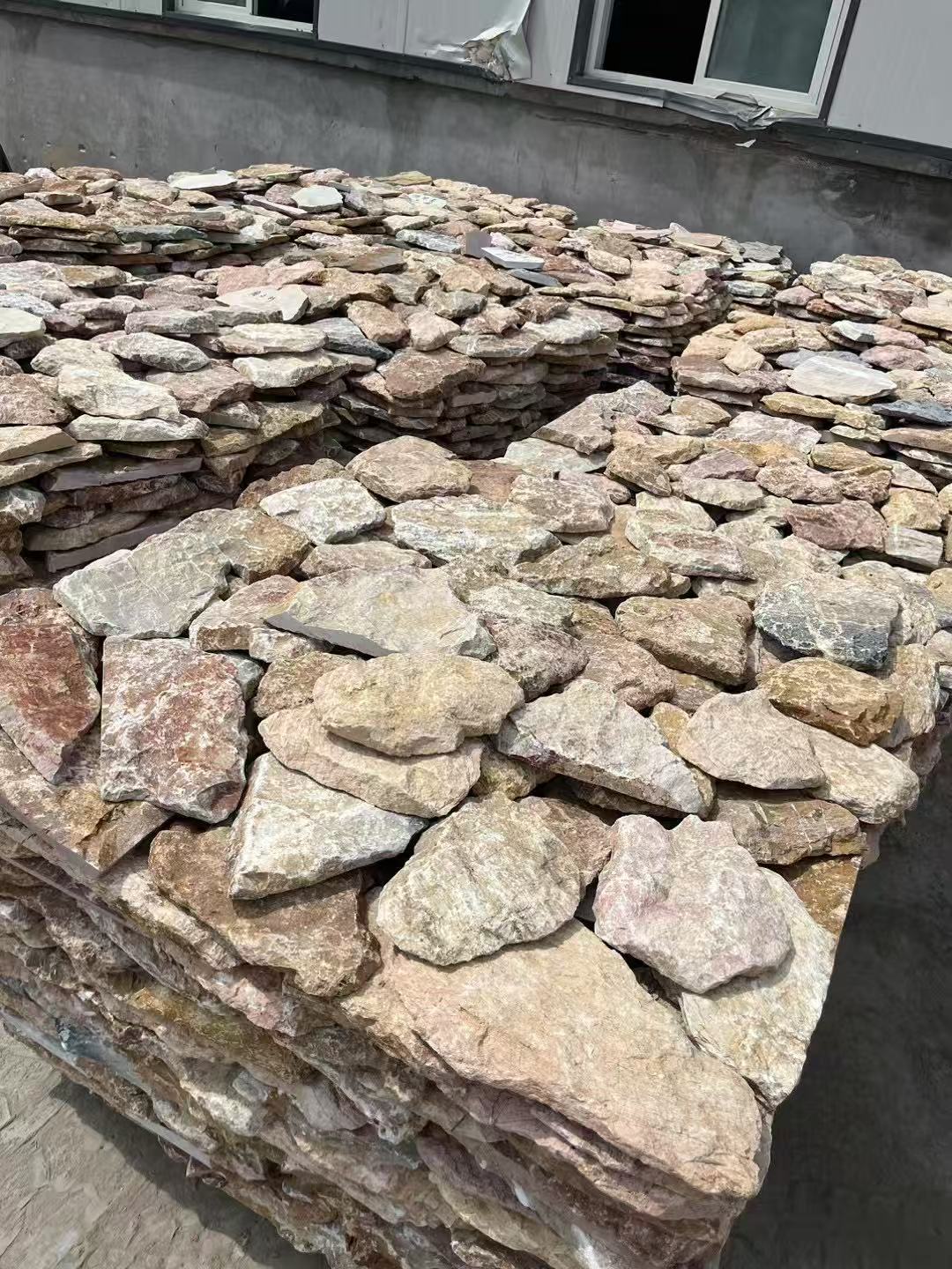 Loose natural stone pieces prepared at the factory
