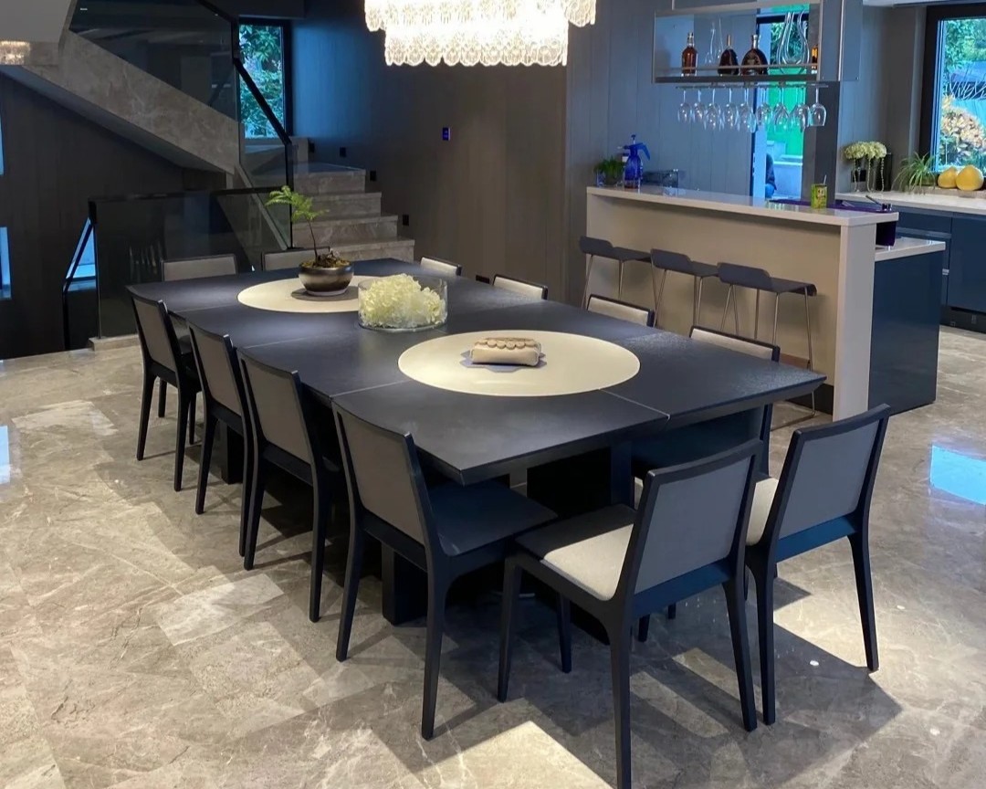 Castle Gray Marble large-format flooring in a contemporary living and dining room.jpg