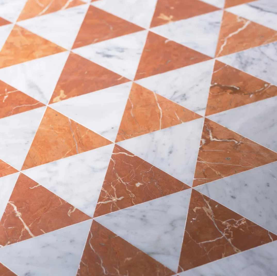 Custom red and white marble geometric tile pattern