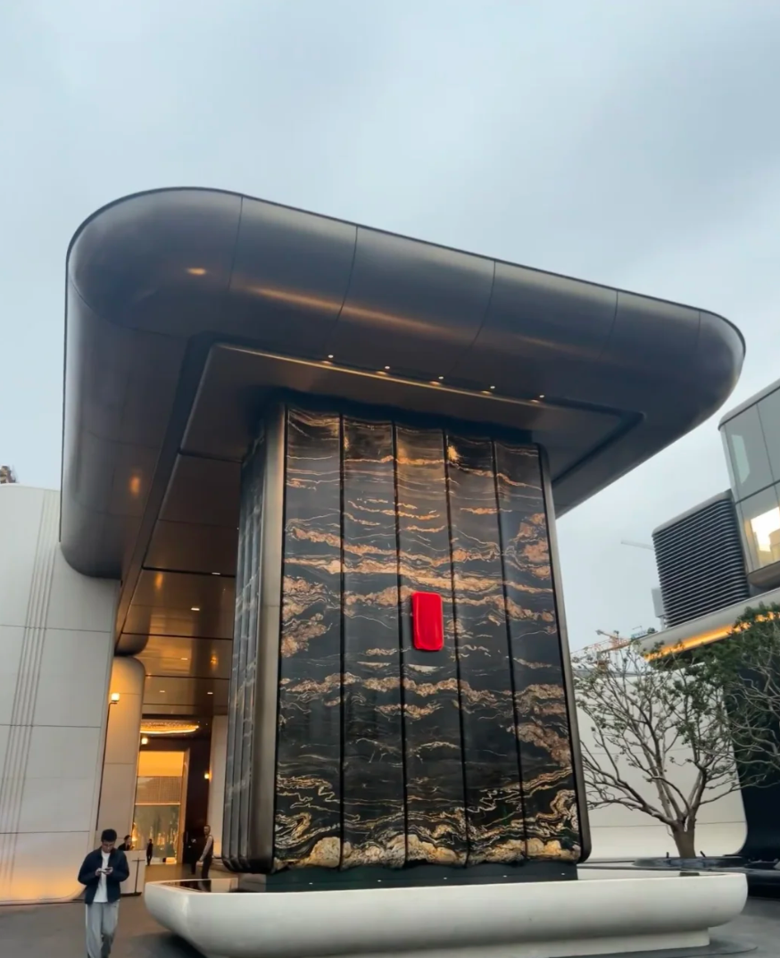 Modern facade feature cladding in Gold Silk Granite