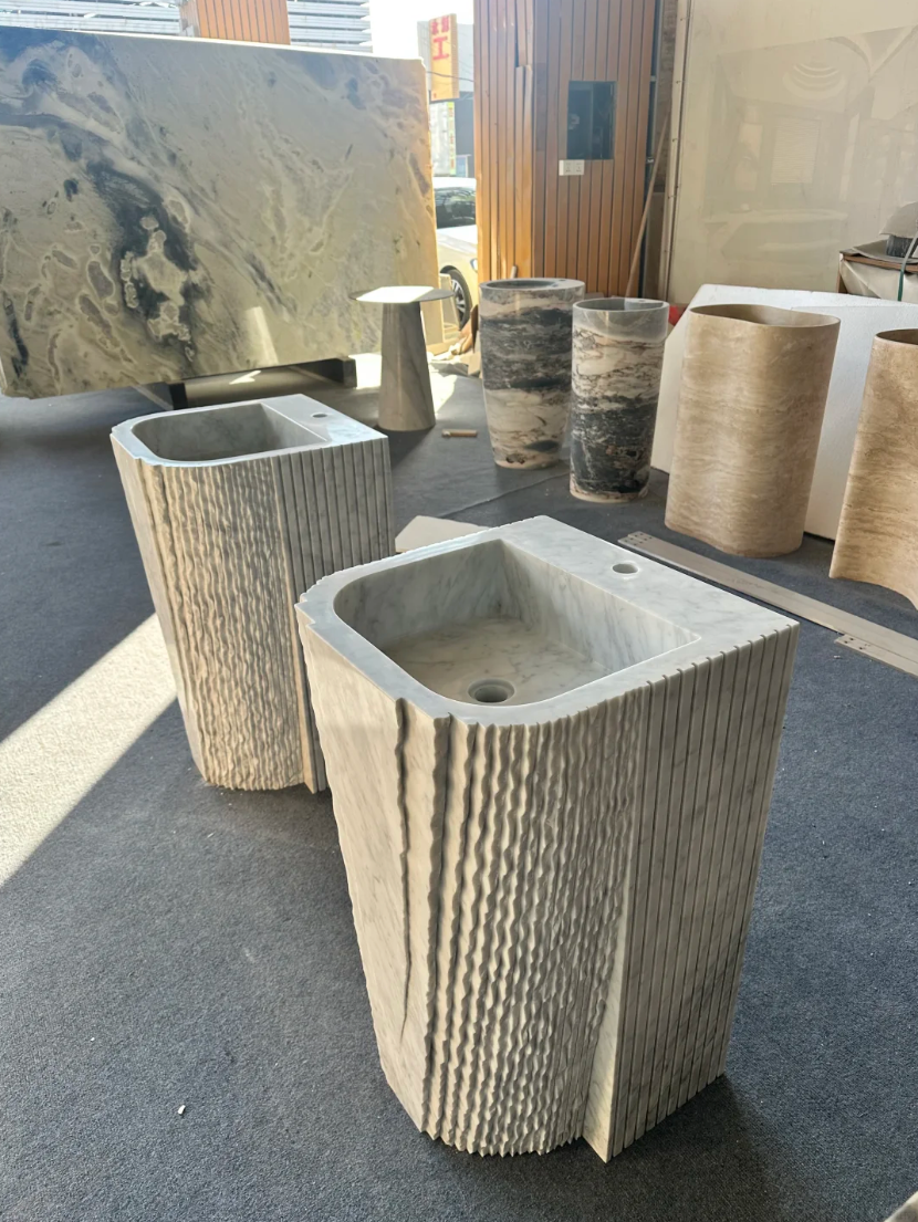 Outdoor stone washbasin in a garden or courtyard setting