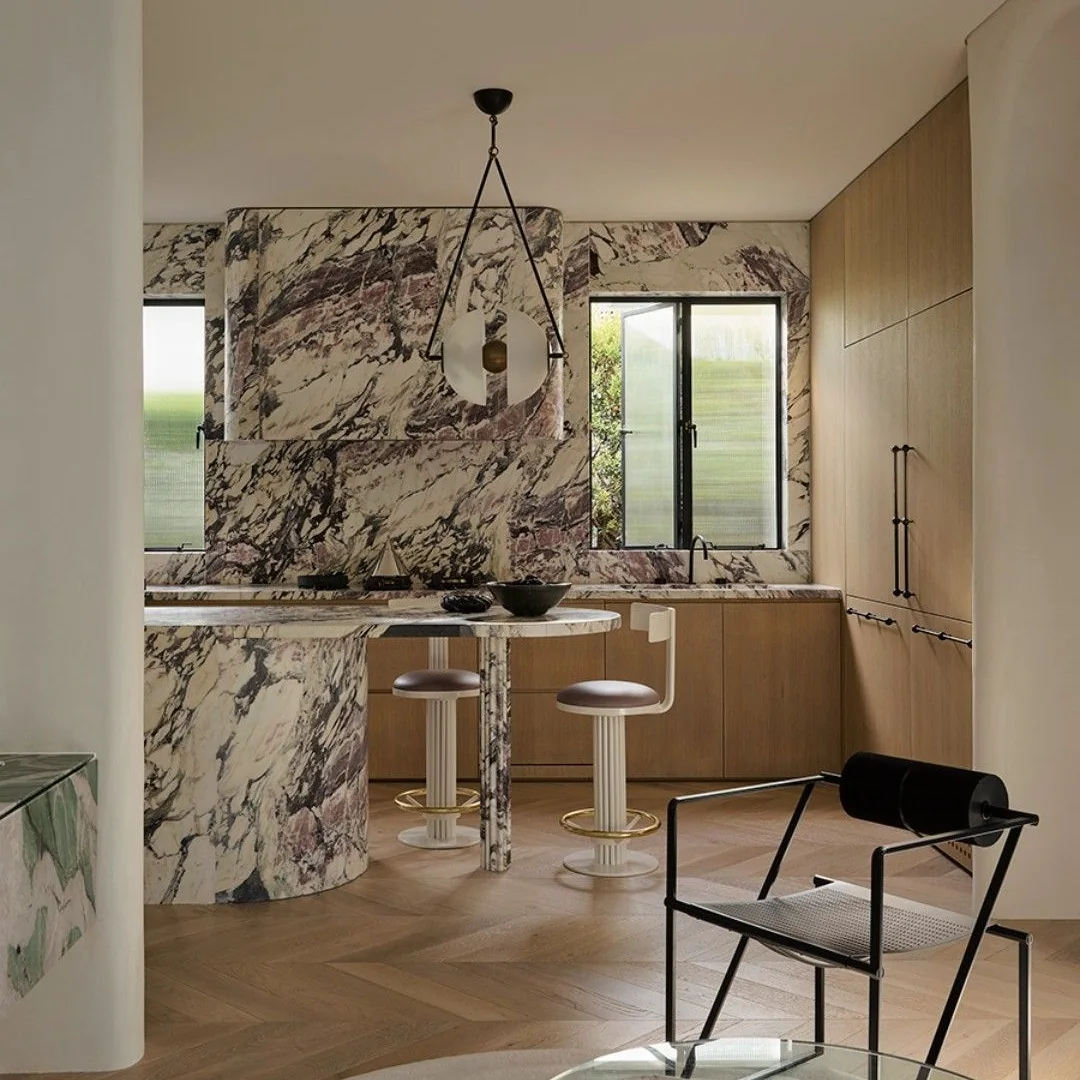breccia-capraia-marble-kitchen-feature-wall.webp