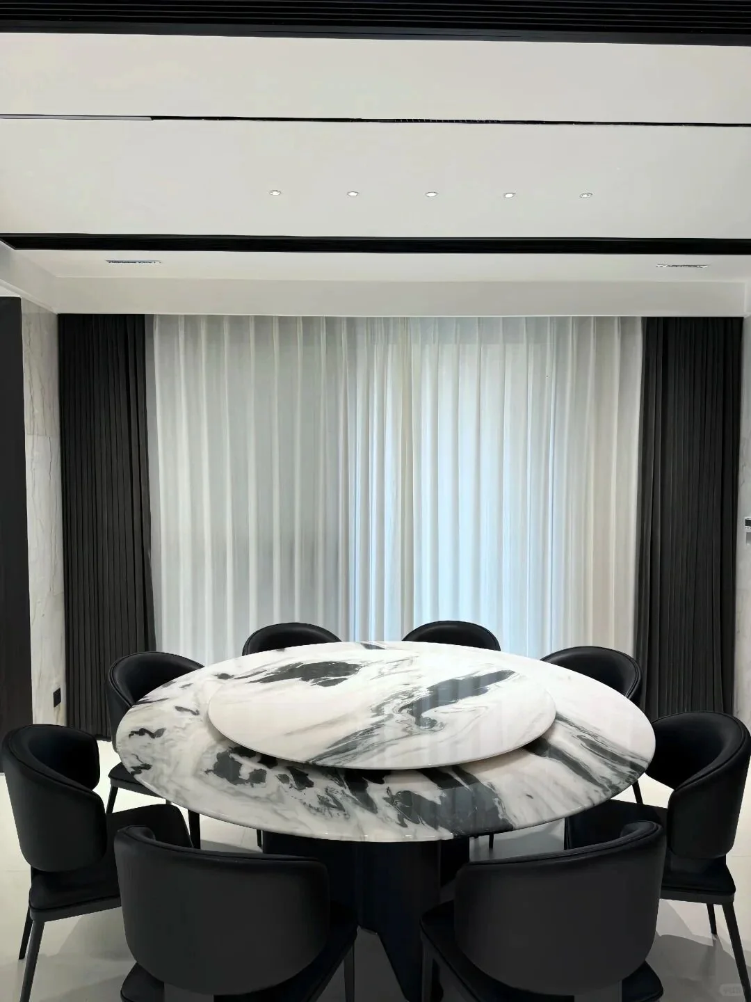 Round Panda White Marble dining table with rotating center tray