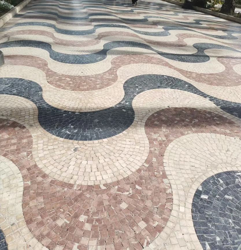 Rojo Alicante marble floor installation in a commercial interior