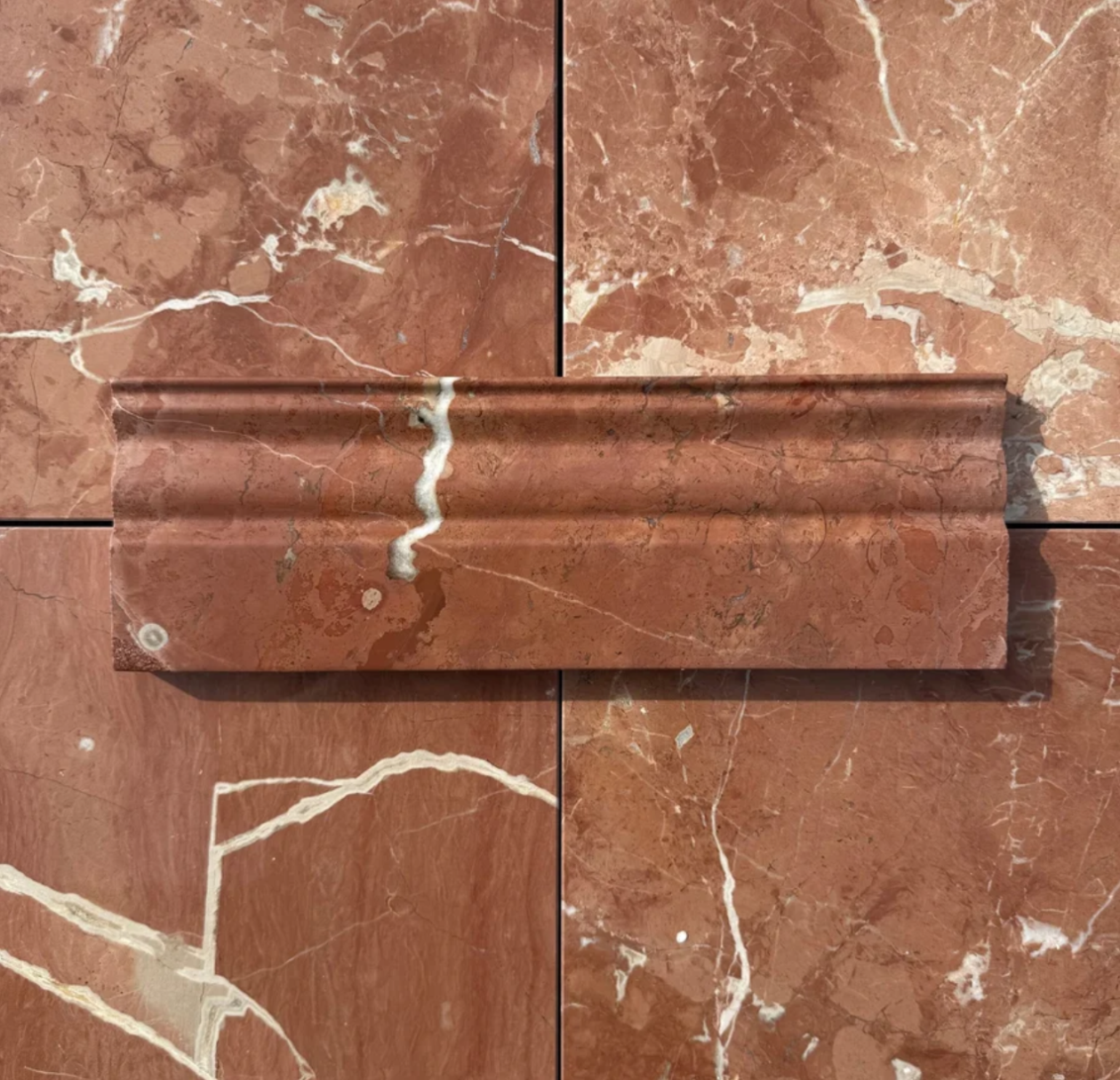 Custom Rojo Alicante marble skirting and moulding profiles