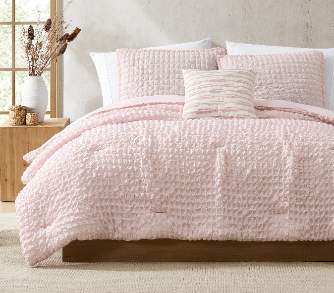 honi-blush-pink-seersucker-bedroom-geometric-pillow-4.png