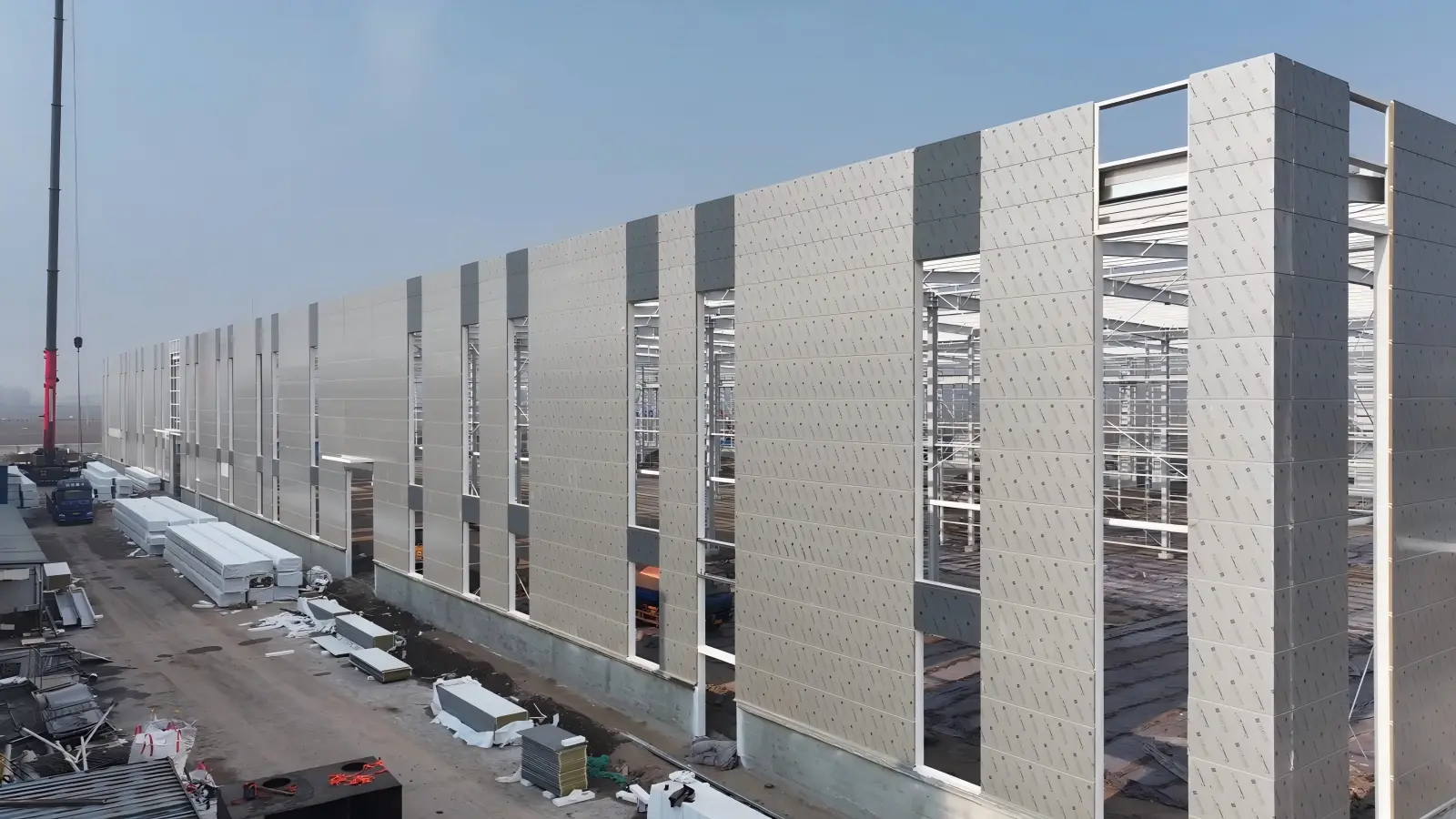 metal sandwich panel installation on industrial warehouse