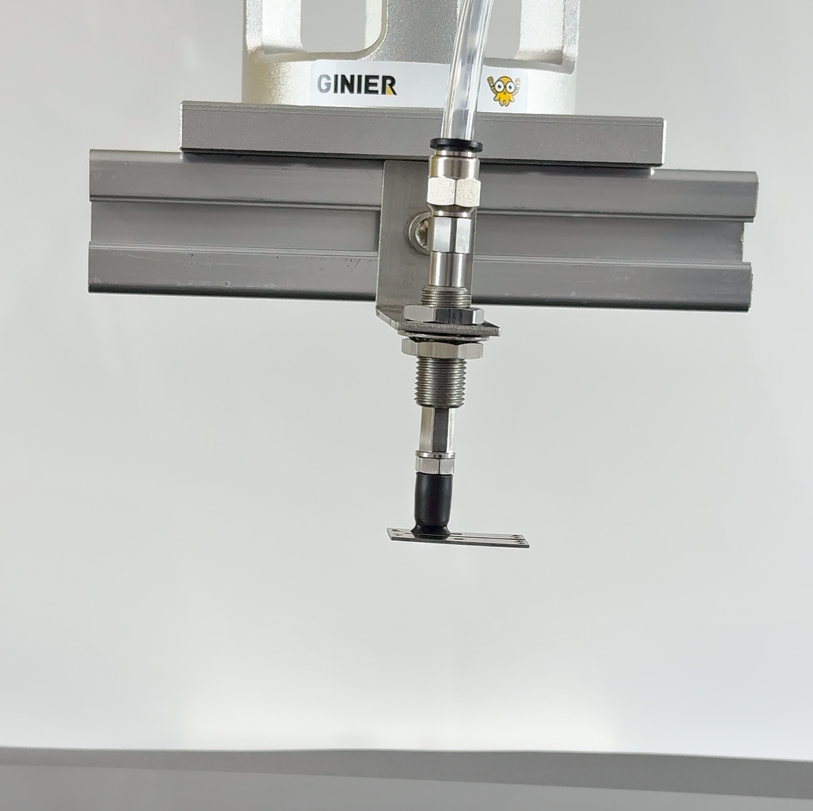 What components are typically included in a vacuum adsorption system?