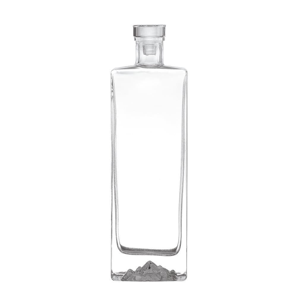High-end crystal white glass liquor bottles, spirits bottles. Available in 1000ml and 750ml, suitable for whisky, vodka, tequila, brandy and other spirits. Supports customized crafts including screen printing, hot stamping and labeling.