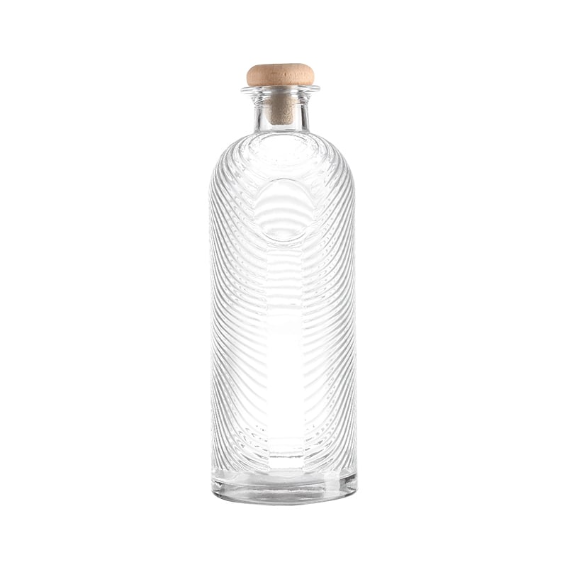 High-quality crystal white glass liquor bottles, spirit bottles available in 750ml and 700ml. Suitable for vodka, tequila, whisky, gin, rum and other spirits, equipped with cork stoppers.